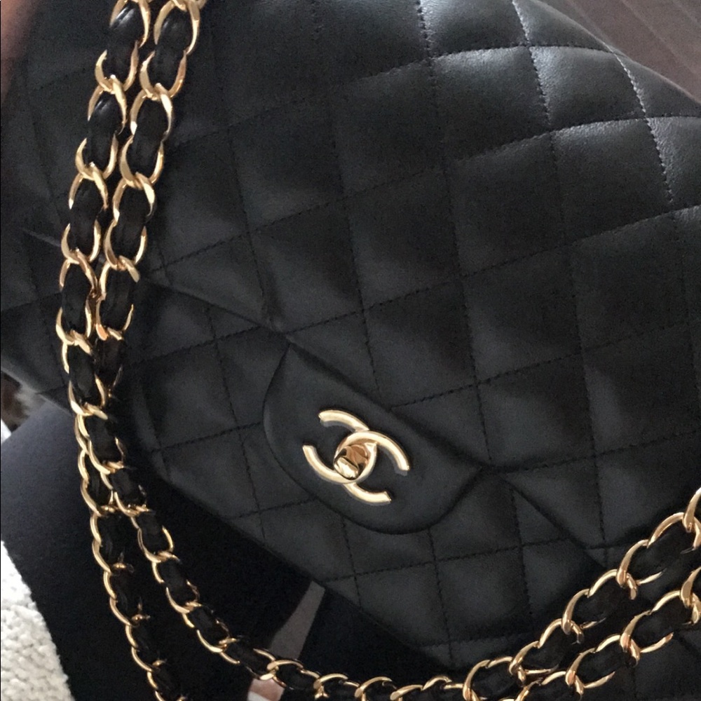 Authentic Chanel Class Jumbo black and gold lamb